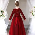 Girls full length net and sequin fabric gown